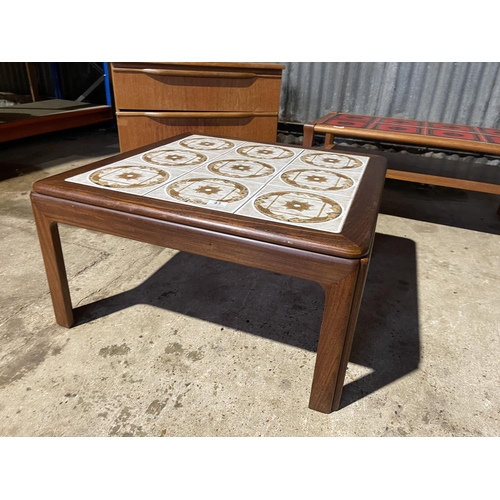 43 - A g plan tile top coffee table together with another coffee table and a media stand