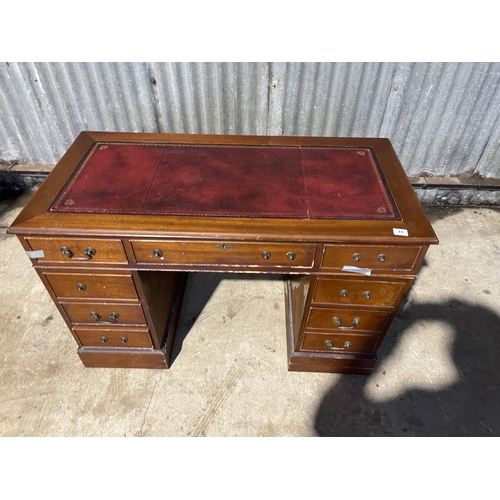 44 - A reproduction pedestal desk AF to handles