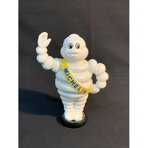 485 - Cast iron Michelin money bank, height 22cms