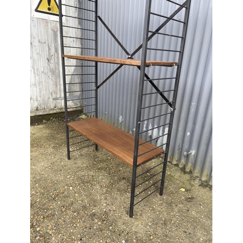 5 - A mid century bay of ladderax shelving with three teak shelves