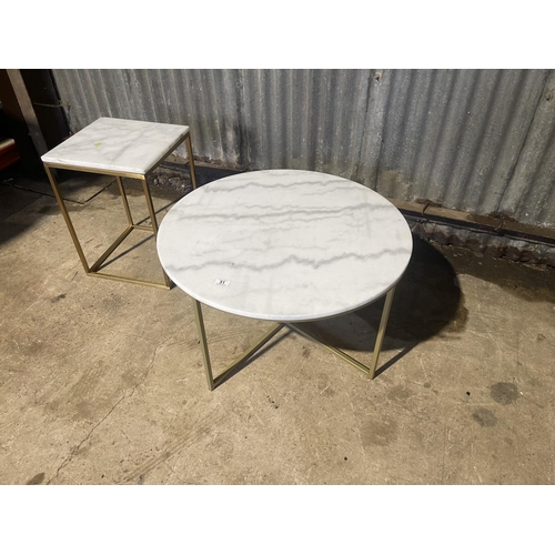 51 - A large circular marble top coffee table together with a small matching square coffee table