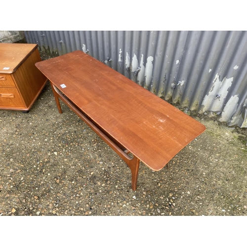 6 - A mid century teak media stand together with a teak coffee table