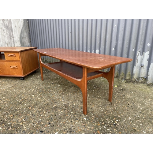 6 - A mid century teak media stand together with a teak coffee table