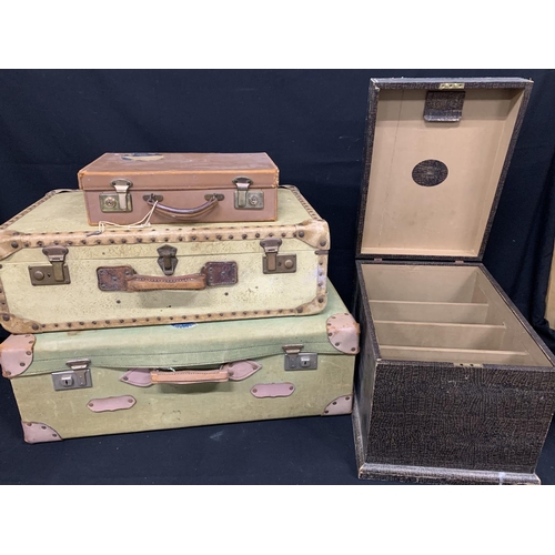 640 - 3 Vintage suitcases and storage cabinet  Largest case 75 x 43cms