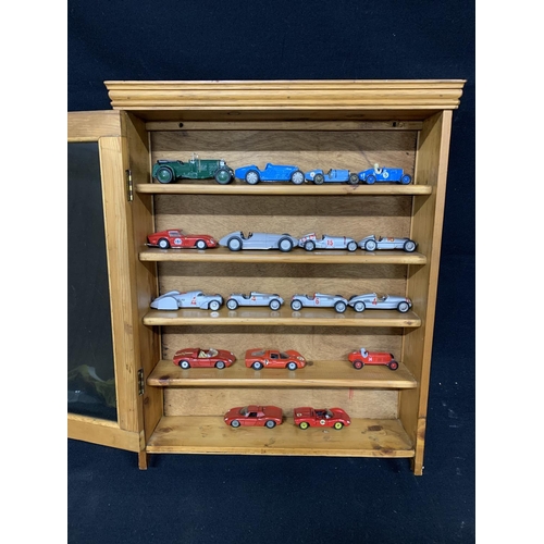 643 - Glazed pine display cabinet and model cars