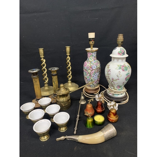 672 - Two porcelain table lamps, two pairs candlesticks, saki Set, horn and candle holders