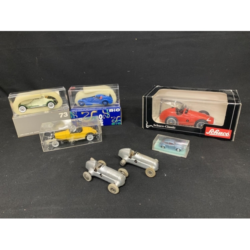 680 - Two vintage Schuco micro racer Mercedes 1935, Schuco Classic Grand Prix racer and VW Beetle, three b... 