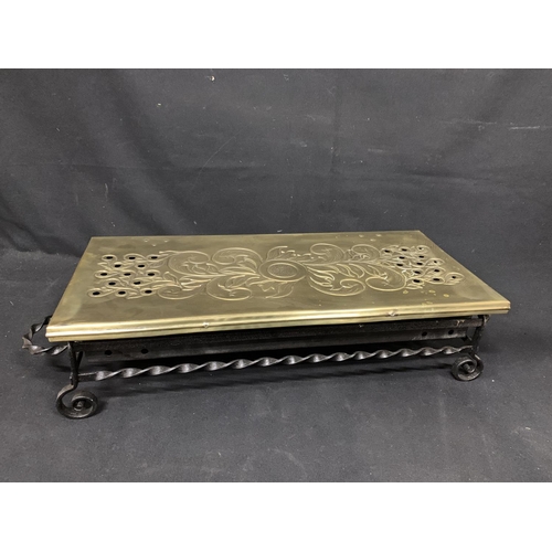 728 - Brass and iron warming tray, brass top 62 x 28 cms