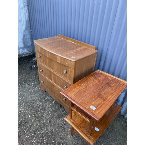 76 - A retro chest of drawers together with two teak side tables