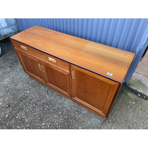 80 - A mid century teak sideboard