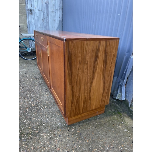 80 - A mid century teak sideboard