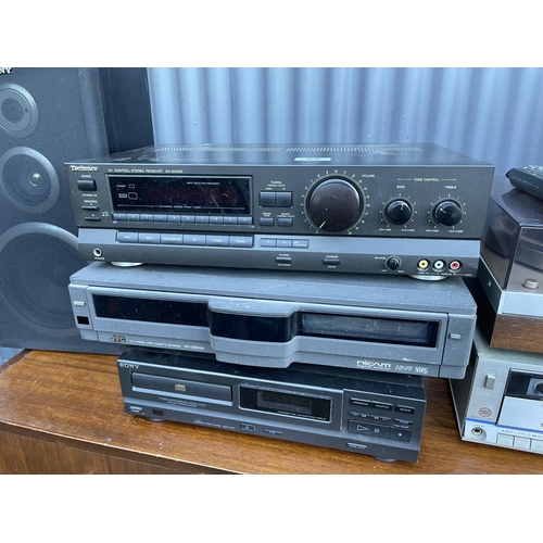 85 - A collection of hifi equipment including Phillips deck, technics sections and speakers & remote