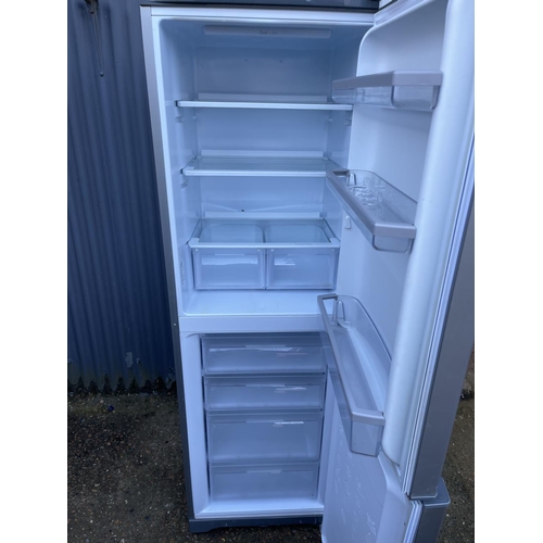 88 - A hotpoint silver upright fridge freezer