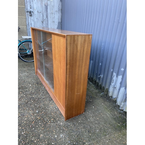 95 - A mid century glazed bookcase 122x 24x78