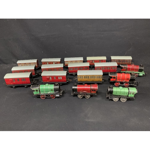 956 - Five Hornby O gauge Tin plate Clockwork locos and twelve carriages (2)