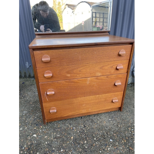 97 - A stag teak dressing chest of four drawers