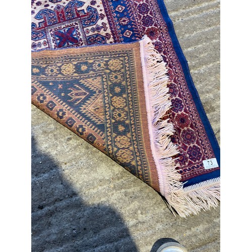 73 - A small silky oriental rug 115x70