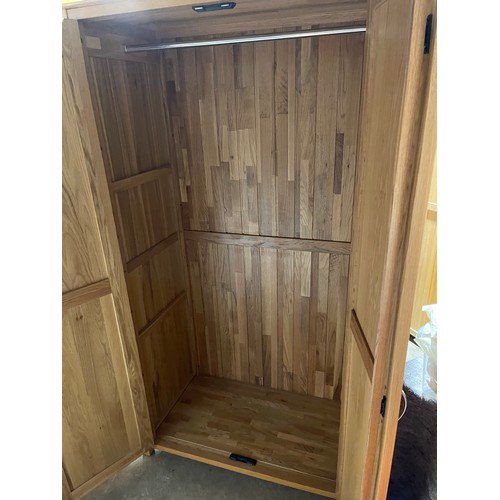 151 - A modern light oak double wardrobe 104x 56x 190