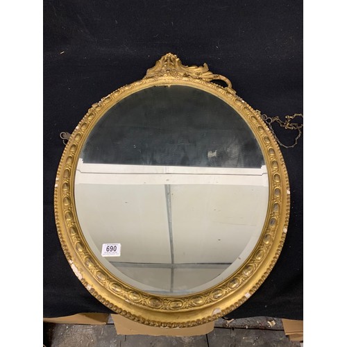 690 - Antique gilt framed mirror a/f, length 87 cms