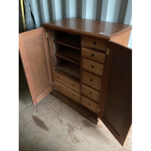 310 - A teak media cabinet fitted to the interior 85x52x103