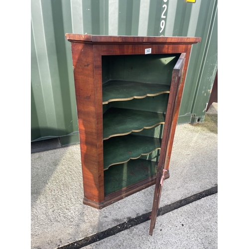 313 - A Georgian mahogany glazed wall hanging corner cabinet