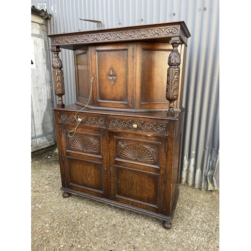 10 - A carved oak court cupboard sideboard 123x52x166