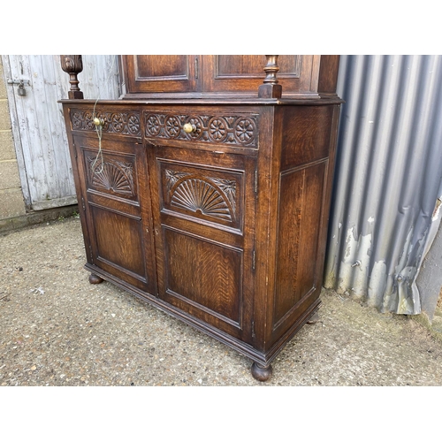 10 - A carved oak court cupboard sideboard 123x52x166