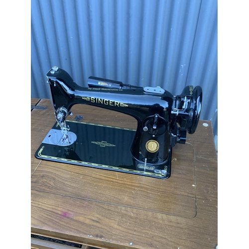 100 - Singer foldaway electric sewing machine with leads and pedal