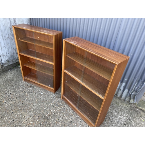 138 - A pair of glazed teak bookcases by GIBBS 77x24x113