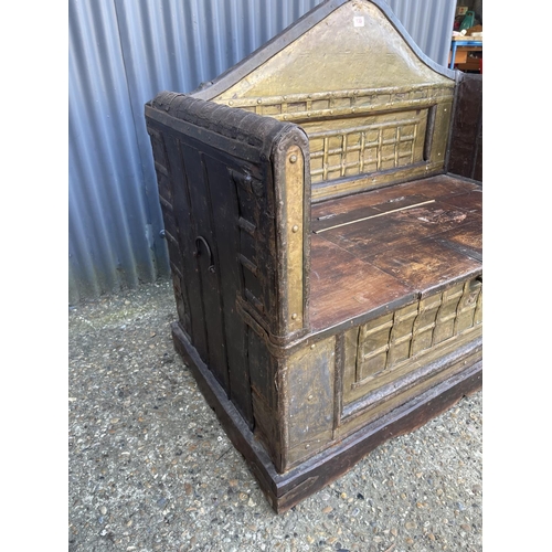 139 - An eastern style brass overlaid blanket box bench seat 122x67x120. VERY HEAVY.