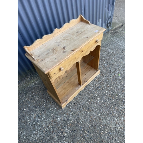 140 - A small pine bookcase with drawer 77x 34x80