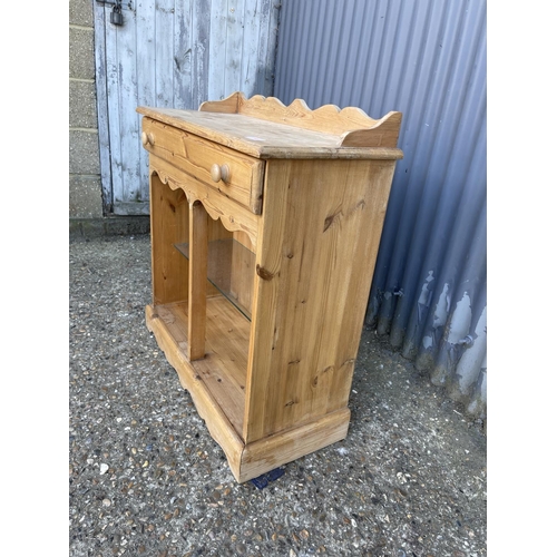 140 - A small pine bookcase with drawer 77x 34x80