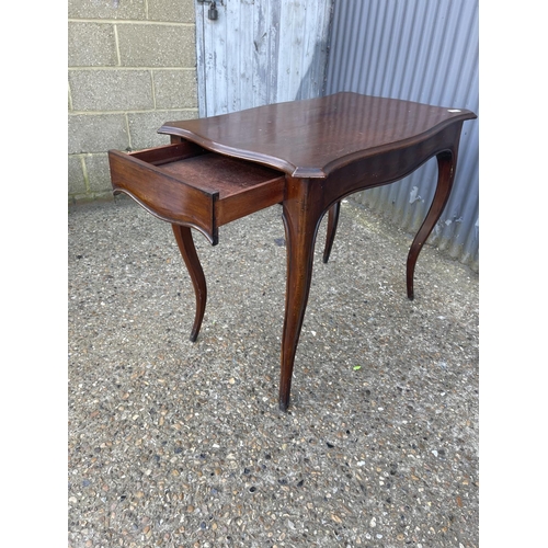 144 - A Victorian mahogany serpentine shaped table with drawer 97x 60 x80