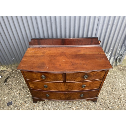 148 - A mahogany bow front chest of four drawers 104x54x78