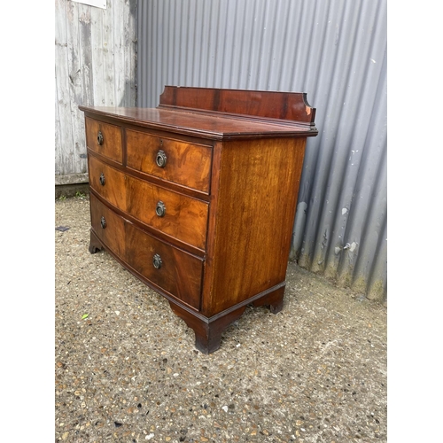 148 - A mahogany bow front chest of four drawers 104x54x78