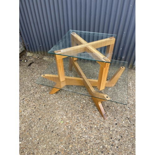 156 - A modern light oak coffee table with glass top together with similar oak and glass lamps table