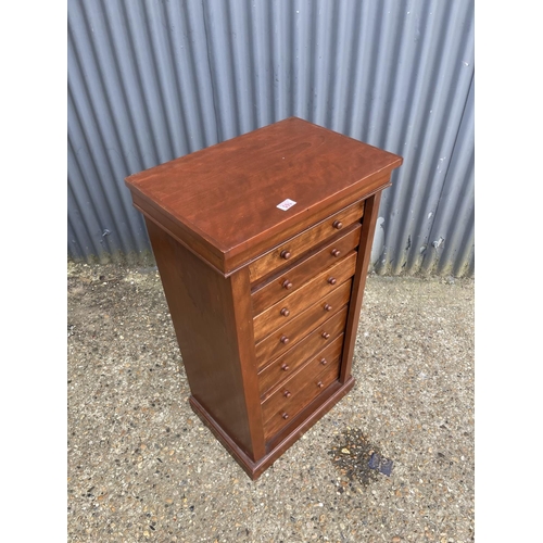 165 - A reproduction mahogany wellington chest 56 x 40x104