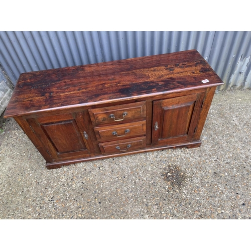 169 - A modern hardwood sideboard 130x44x65