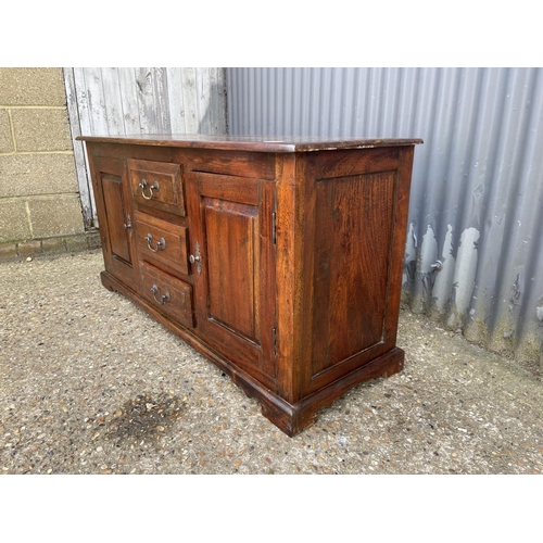 169 - A modern hardwood sideboard 130x44x65