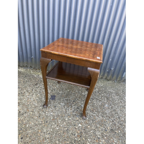 17 - A walnut occasional table