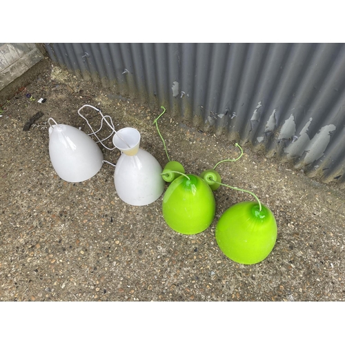 188 - A set of four unusual plastic / Perspex pendant light fittings