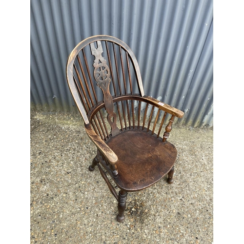 192 - Antique wheel-back carver chair