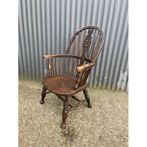 192 - Antique wheel-back carver chair