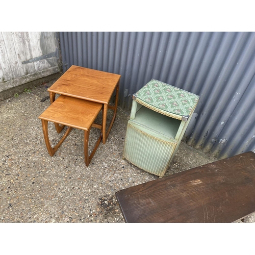 195 - A retro nest of two, loom bedside and an oak refectory coffee table