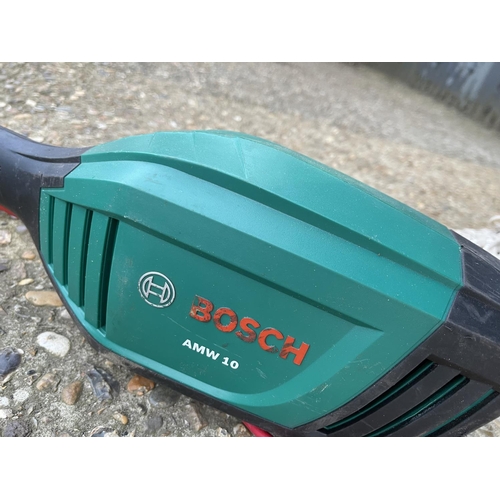 211 - A Bosch long arm electric pole saw with extension