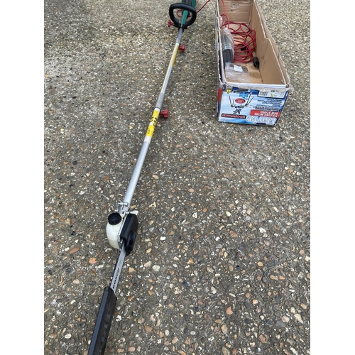 211 - A Bosch long arm electric pole saw with extension