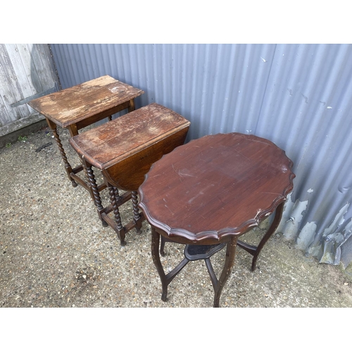 214 - Two oak barley twist tables and a mahogany occasional table