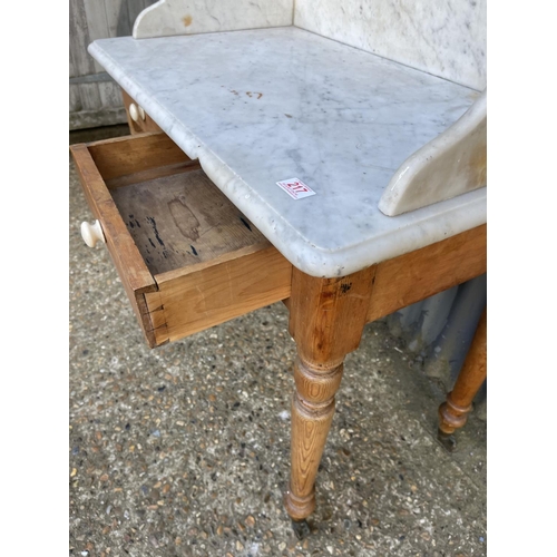 217 - A country pine washstand with white marble top 87x 50x90