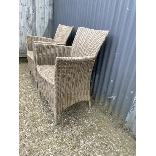 226 - A pair of ratan garden chairs