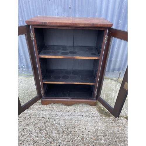 23 - A victorian rosewood two door glazed cabinet with adjustable shelves 66x36x95